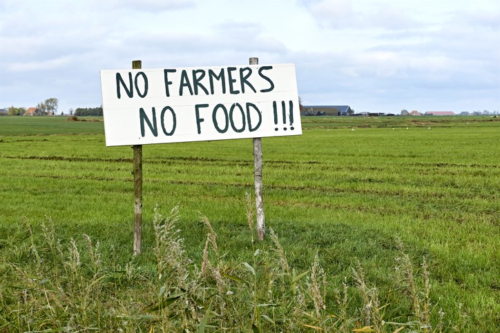 Sign in agricultural field with text No Farmers No Food